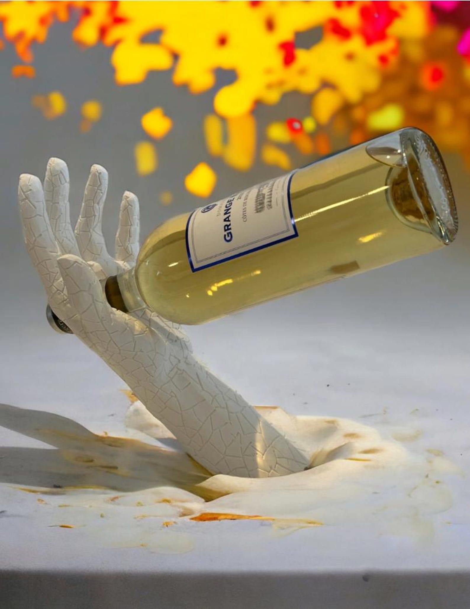 Hand wine bottle holder — on counter lifestyle