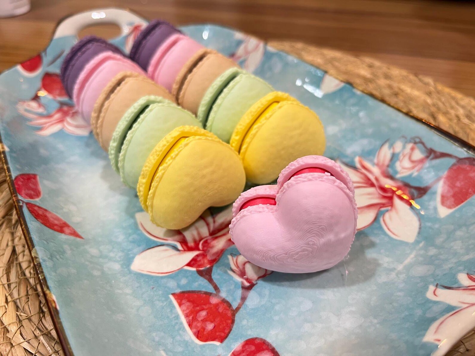 Row of heart-shaped macaron fidget clickers