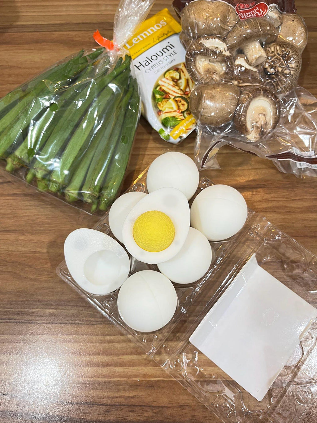 3D printed hard-boiled egg fidget clicker with yellow yolk