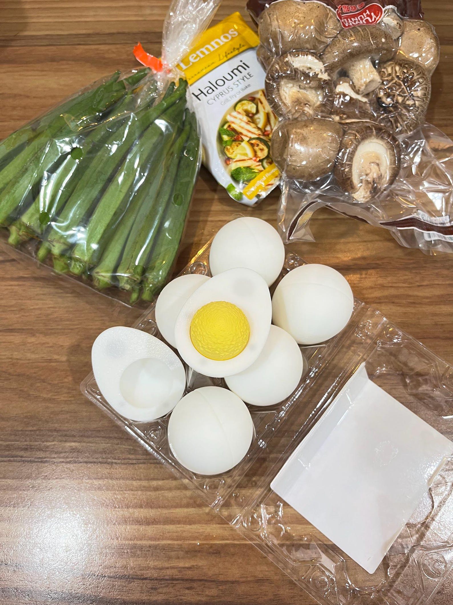3D printed hard-boiled egg fidget clicker with yellow yolk