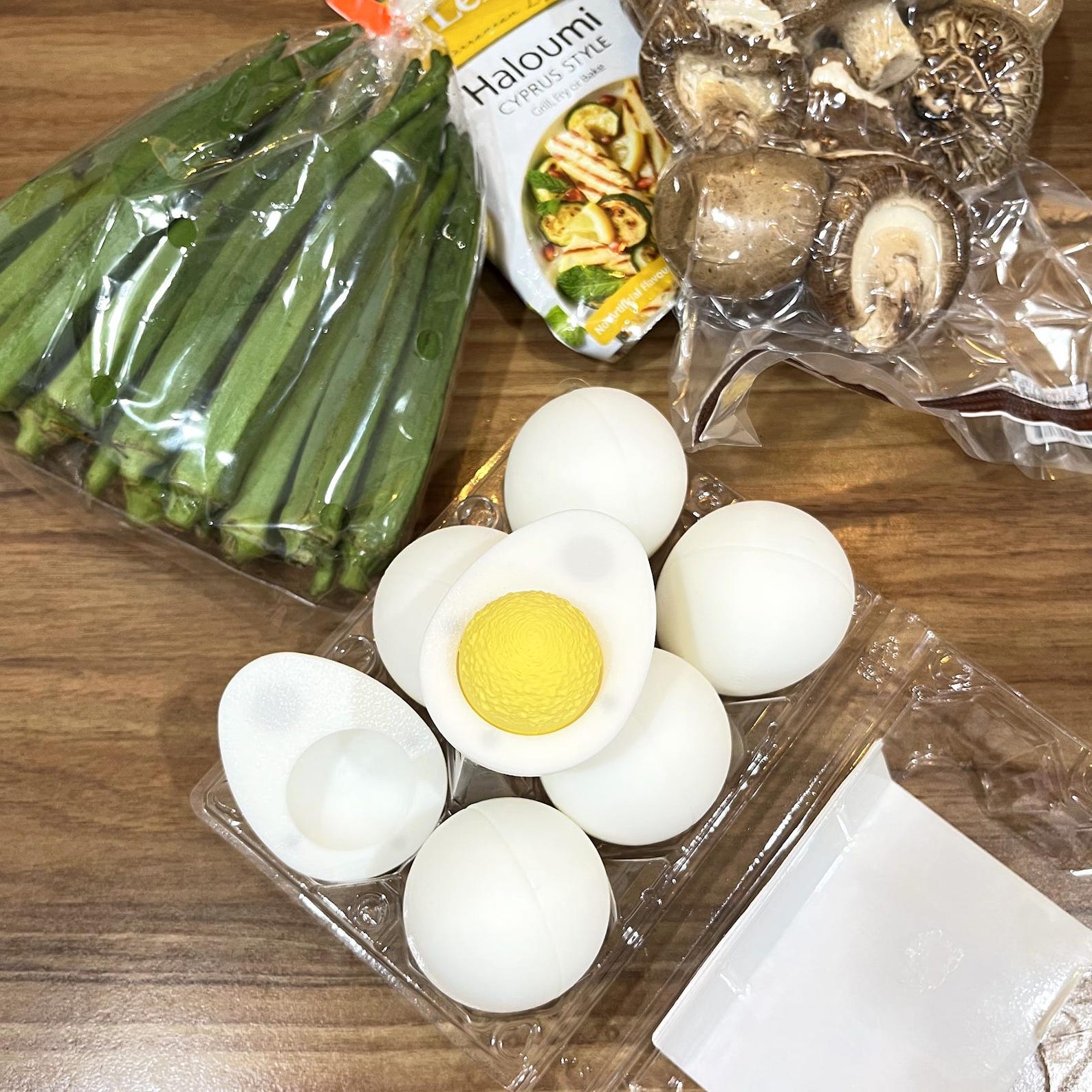 Egg clicker fidget in a carton, yolk revealed