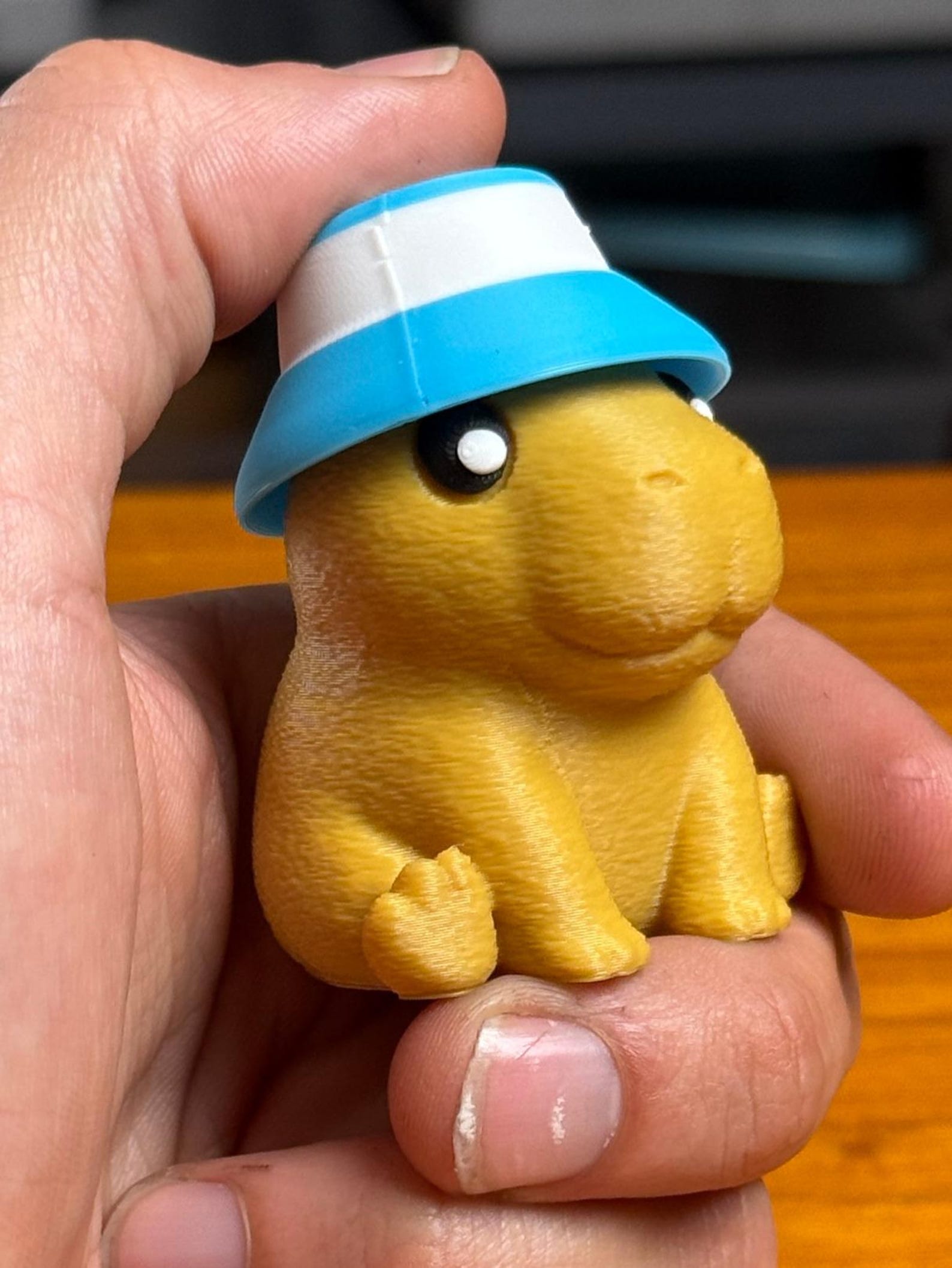 Seated capybara clicker toy detail