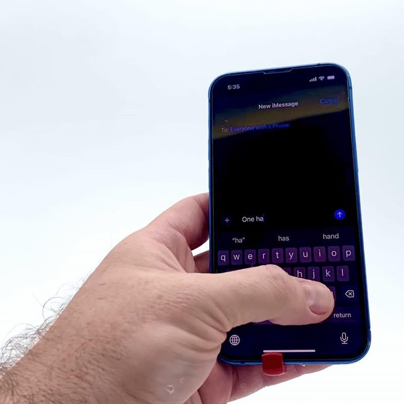 Six-finger phone grip texting accessory in use