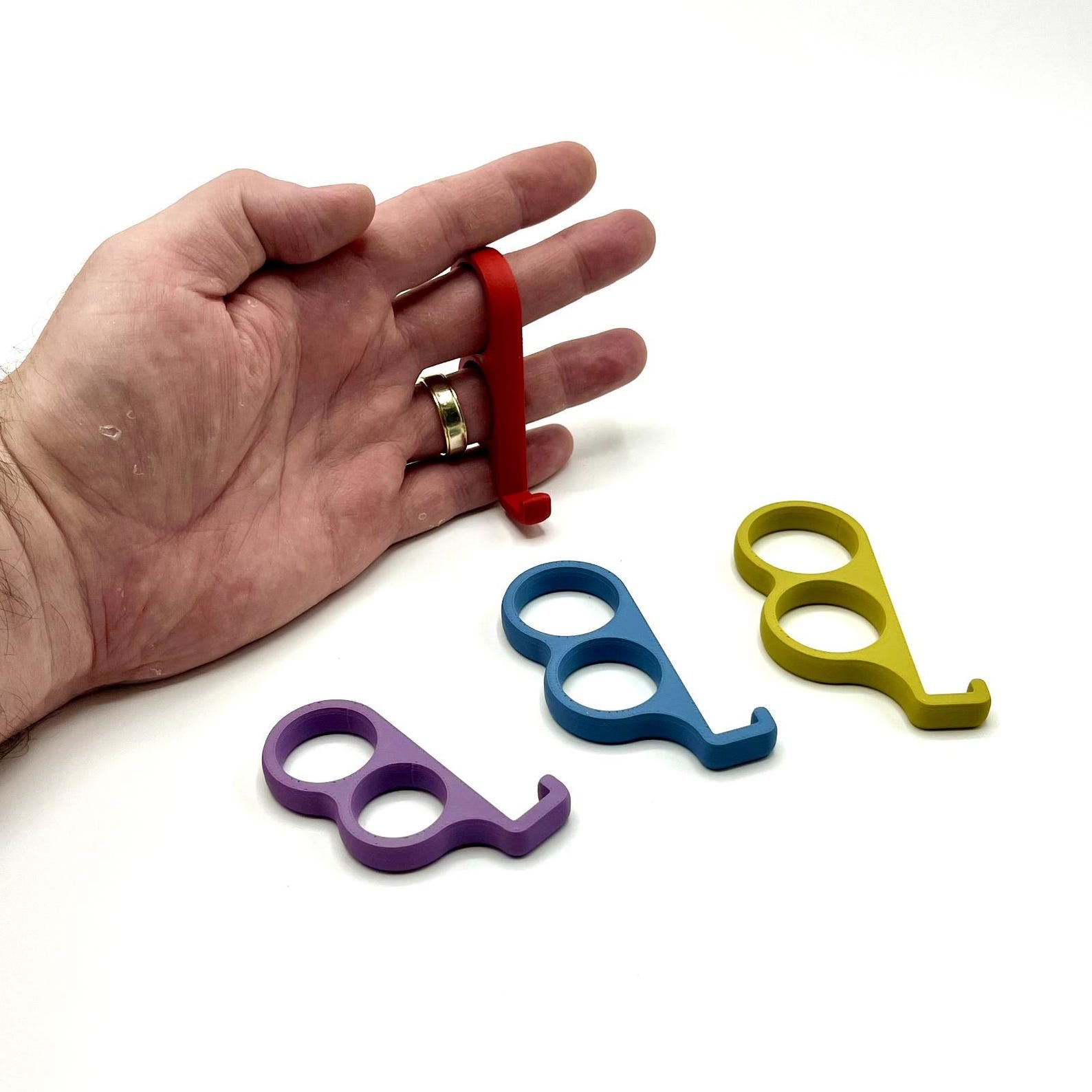 Six-finger phone grip worn on finger