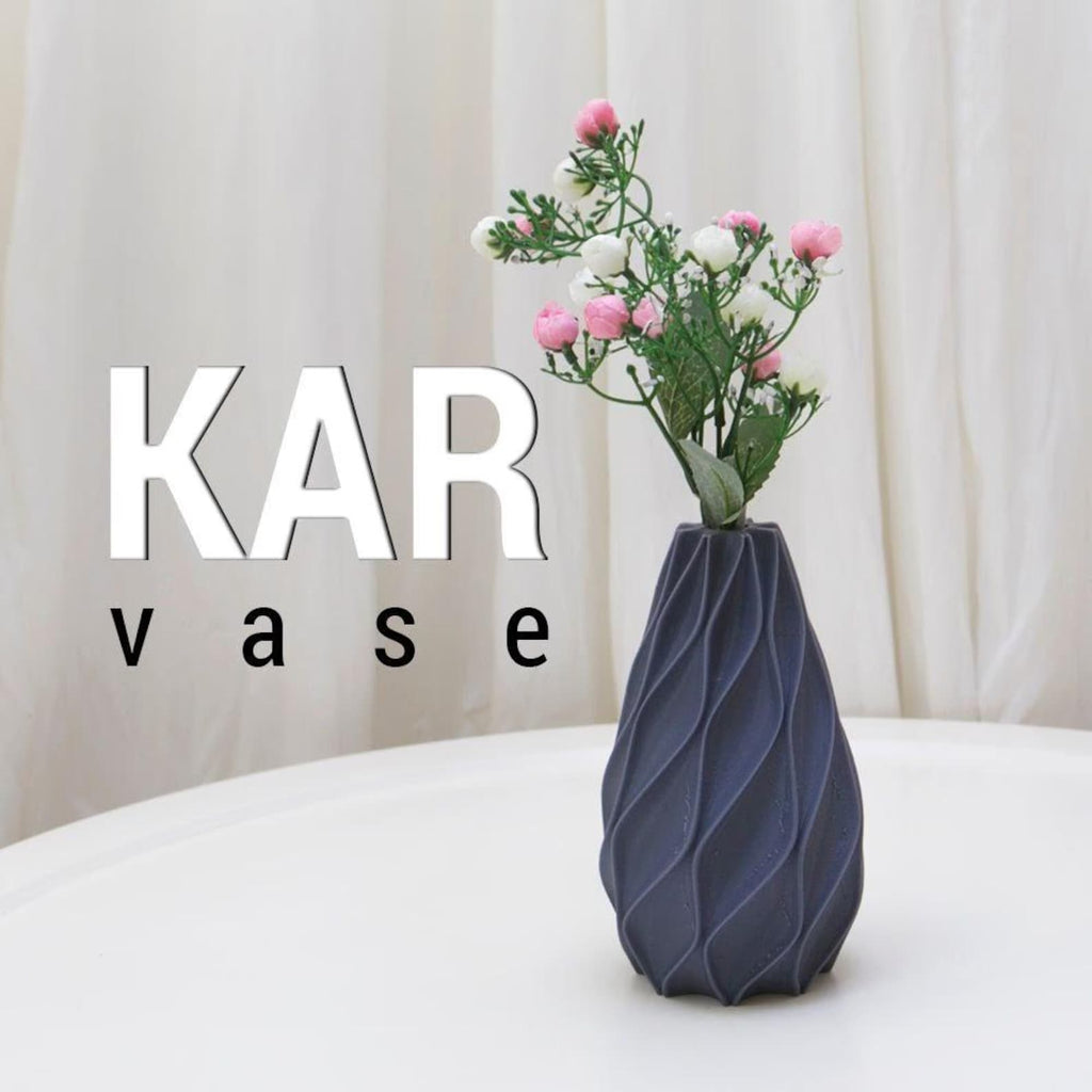 Kar 3D printed sculptural geometric vase on a modern side table