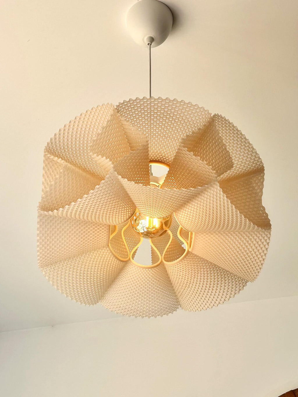 Detail of the pleated modules on the pendant shade