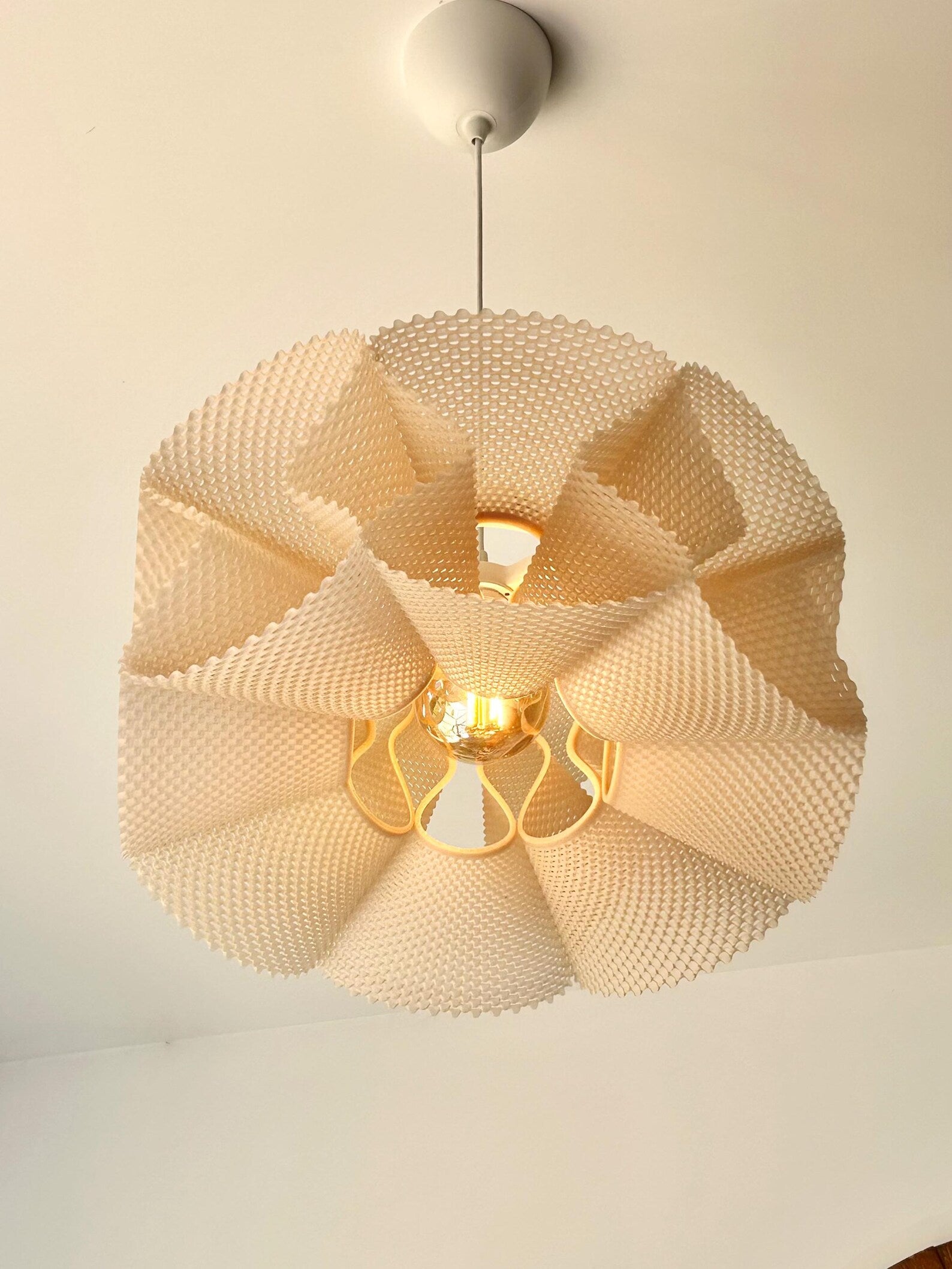 Detail of the pleated modules on the pendant shade