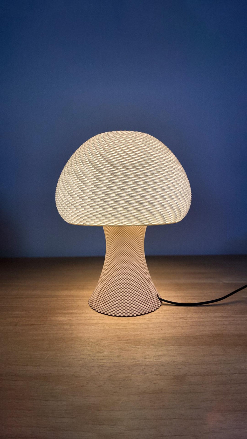 Mushroom table lamp shown from the side