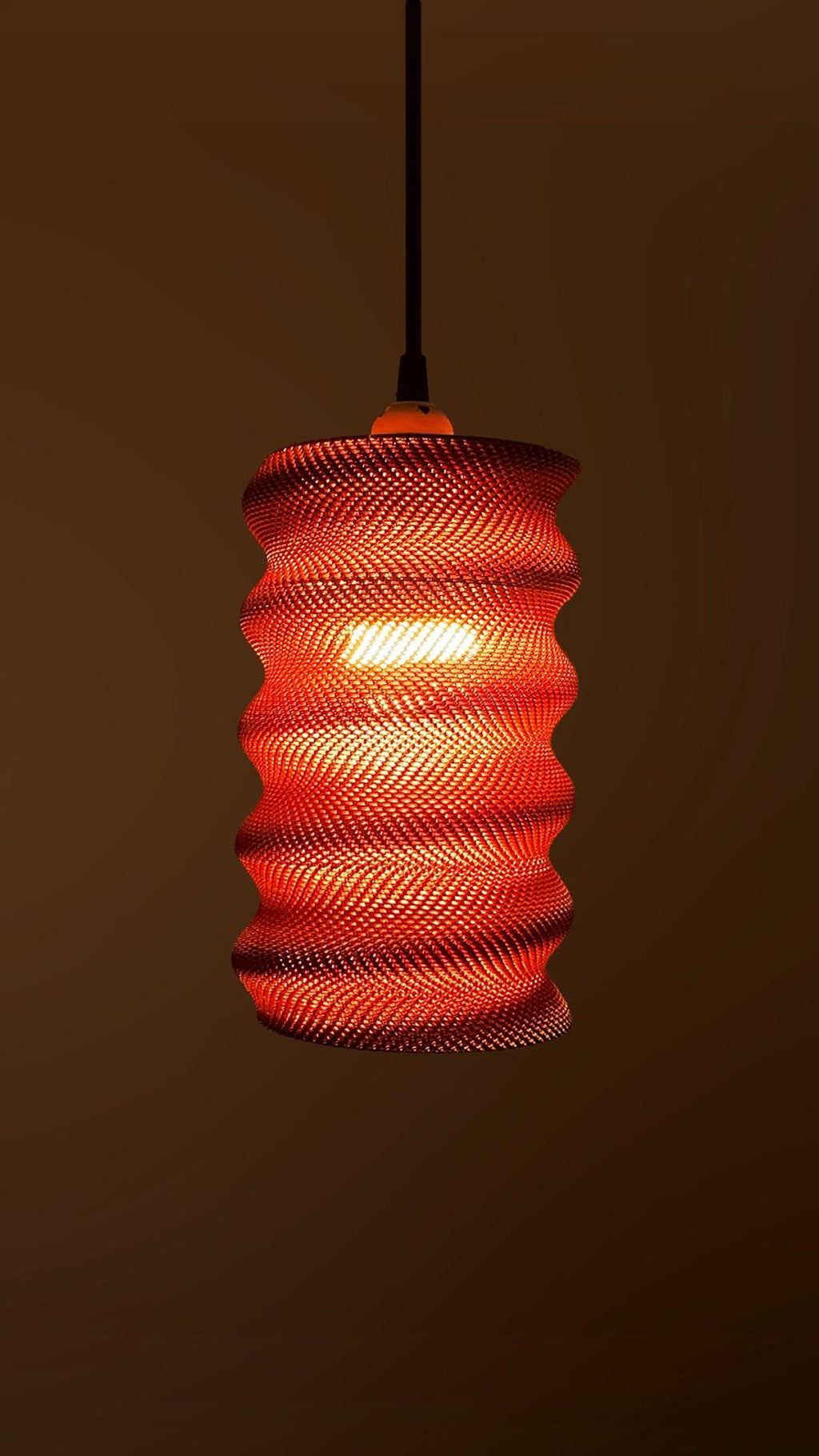 Spiral lamp shade on a table base