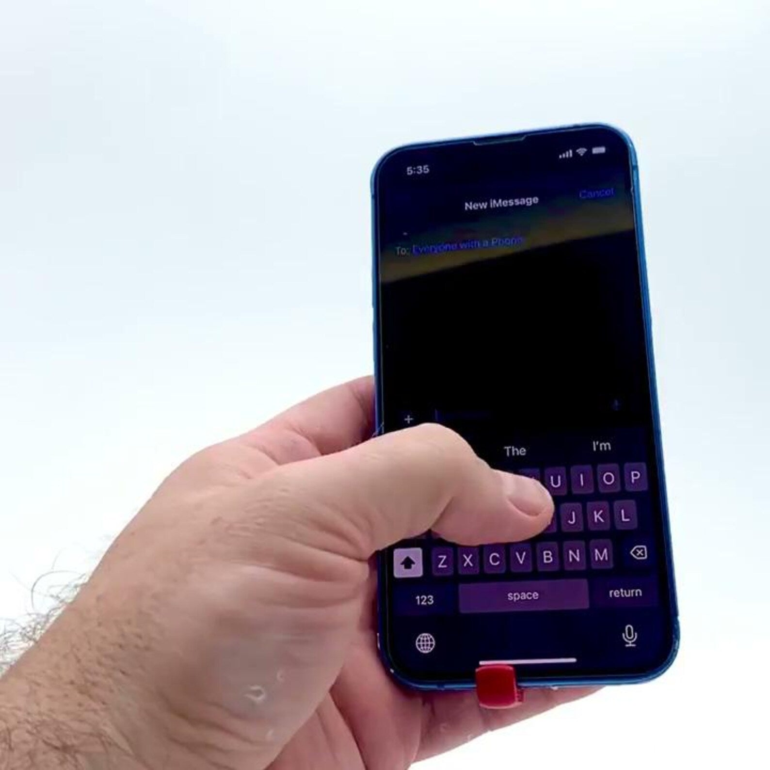 Six-finger phone grip attached to smartphone