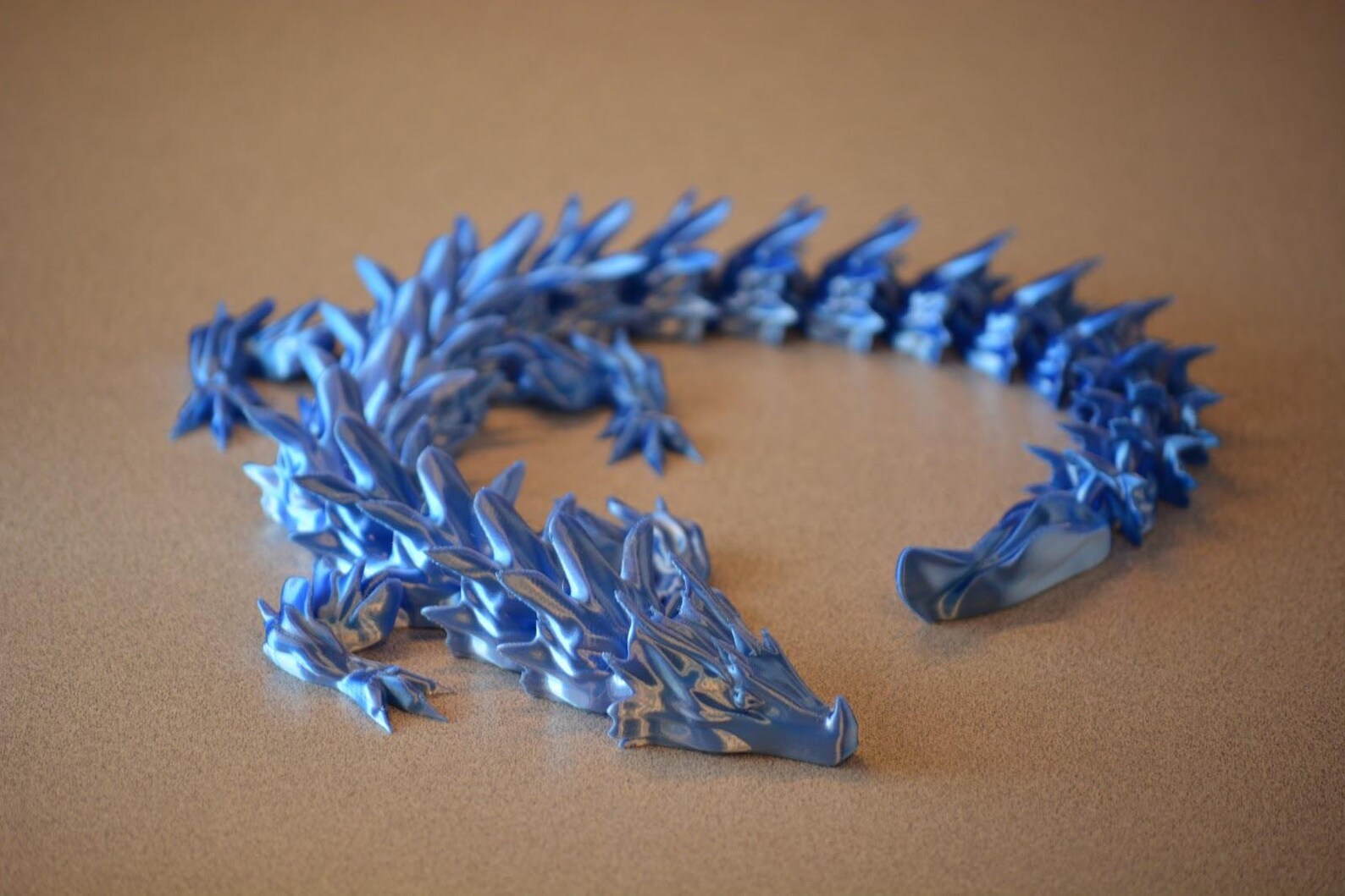 Articulated water dragon flexi body with dorsal spikes