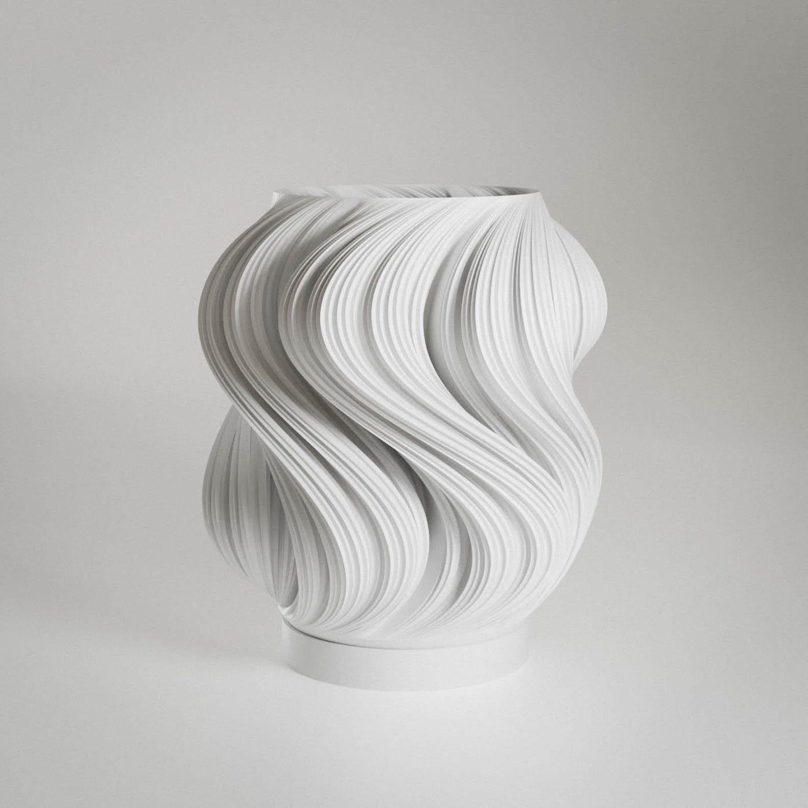 Sculptural spiraling wave texture of the modern lamp