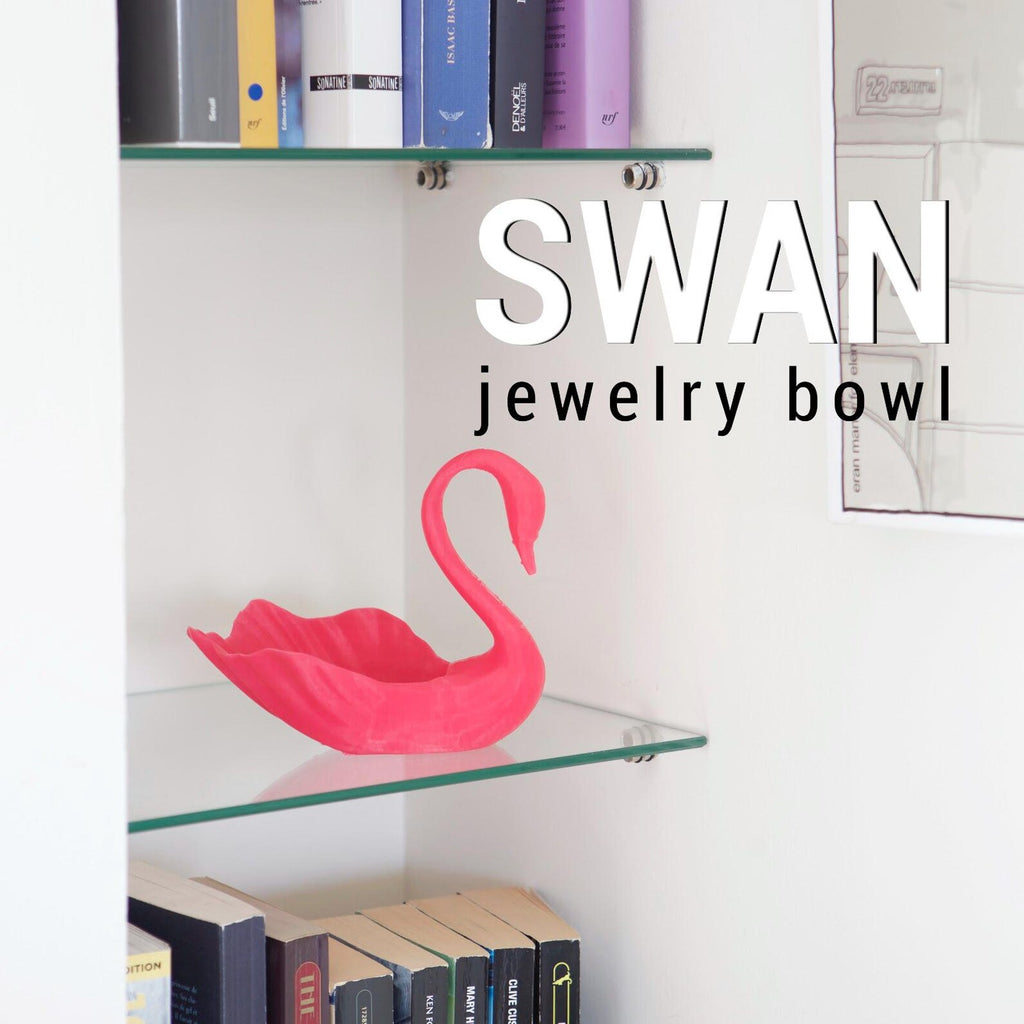 Swan jewelry bowl styled on shelf