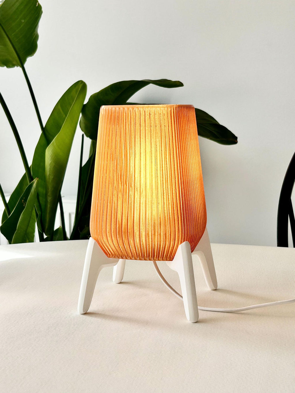 Modern table lamp showing interchangeable shade styles