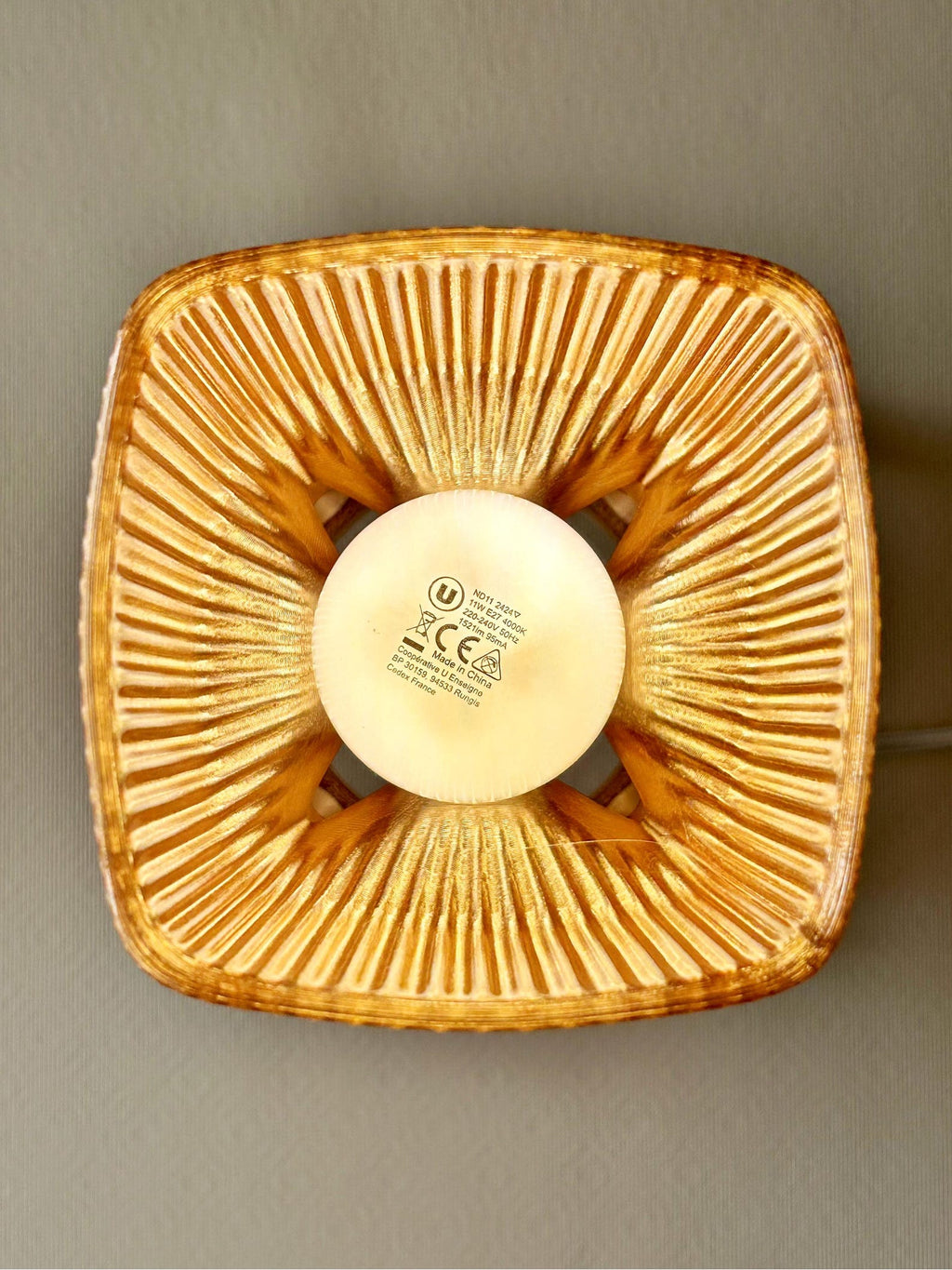Modern table lamp lit in a warm cozy interior