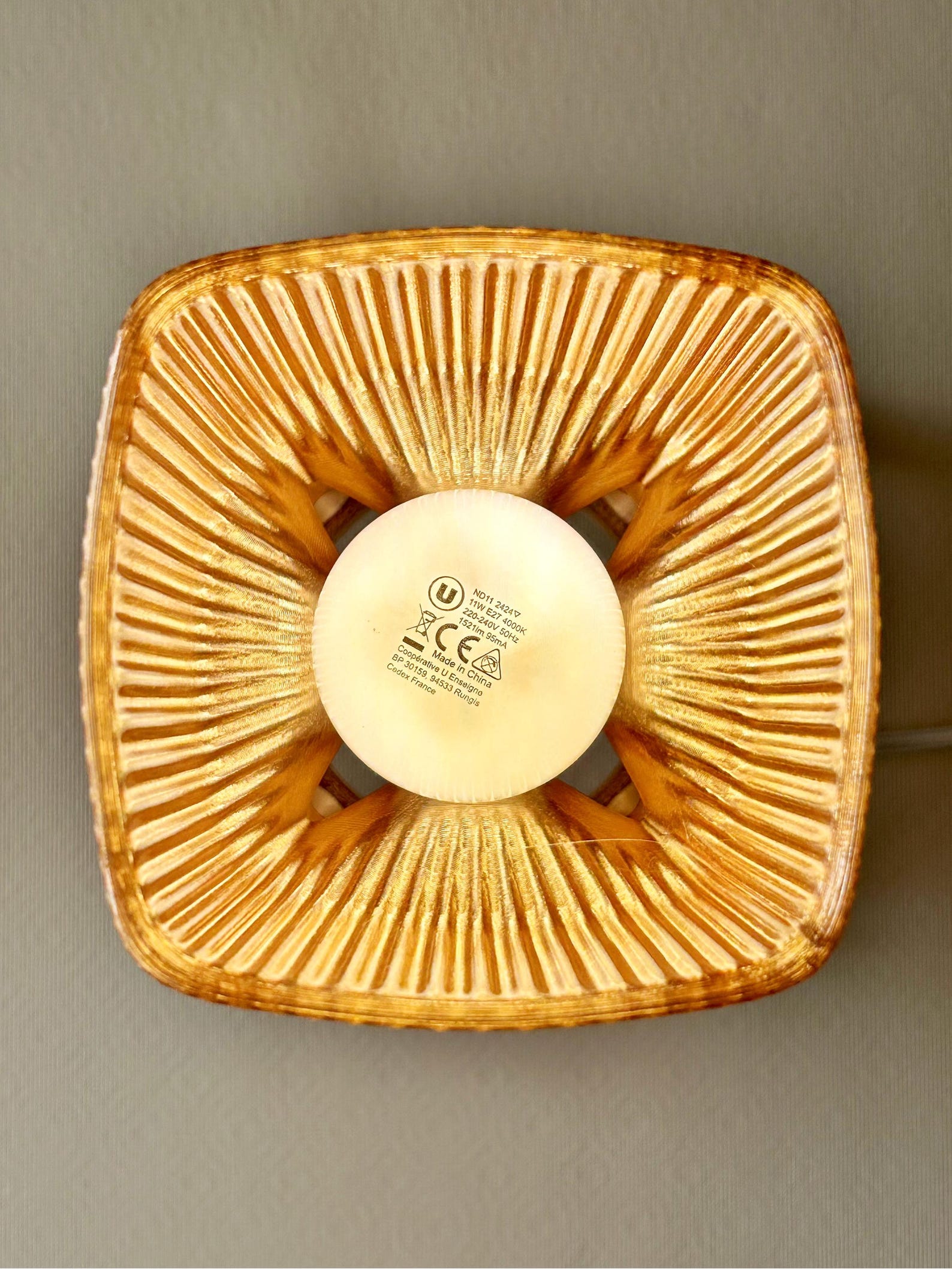 Modern table lamp lit in a warm cozy interior