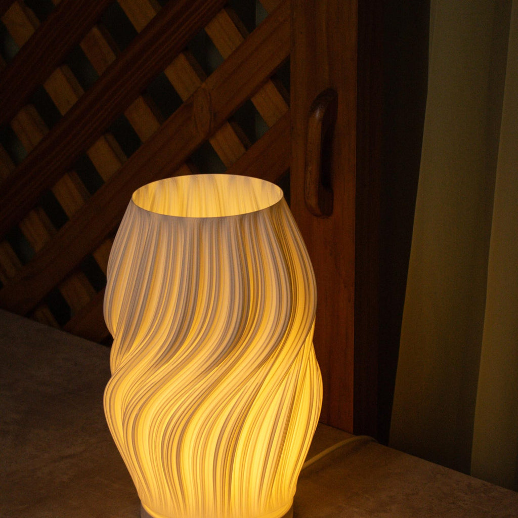 Silk lamp shown in a cozy room setting